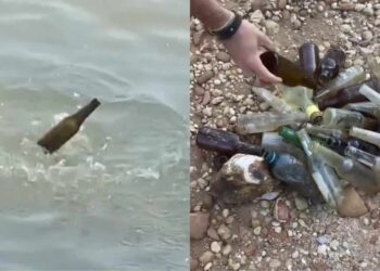 Banhistas retiram várias garrafas do rio tapajós em Itaituba, no PA